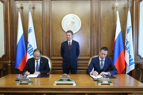 Чэнь Сяохуа, Алексей Миллер и Дмитрий Конов во время подписания